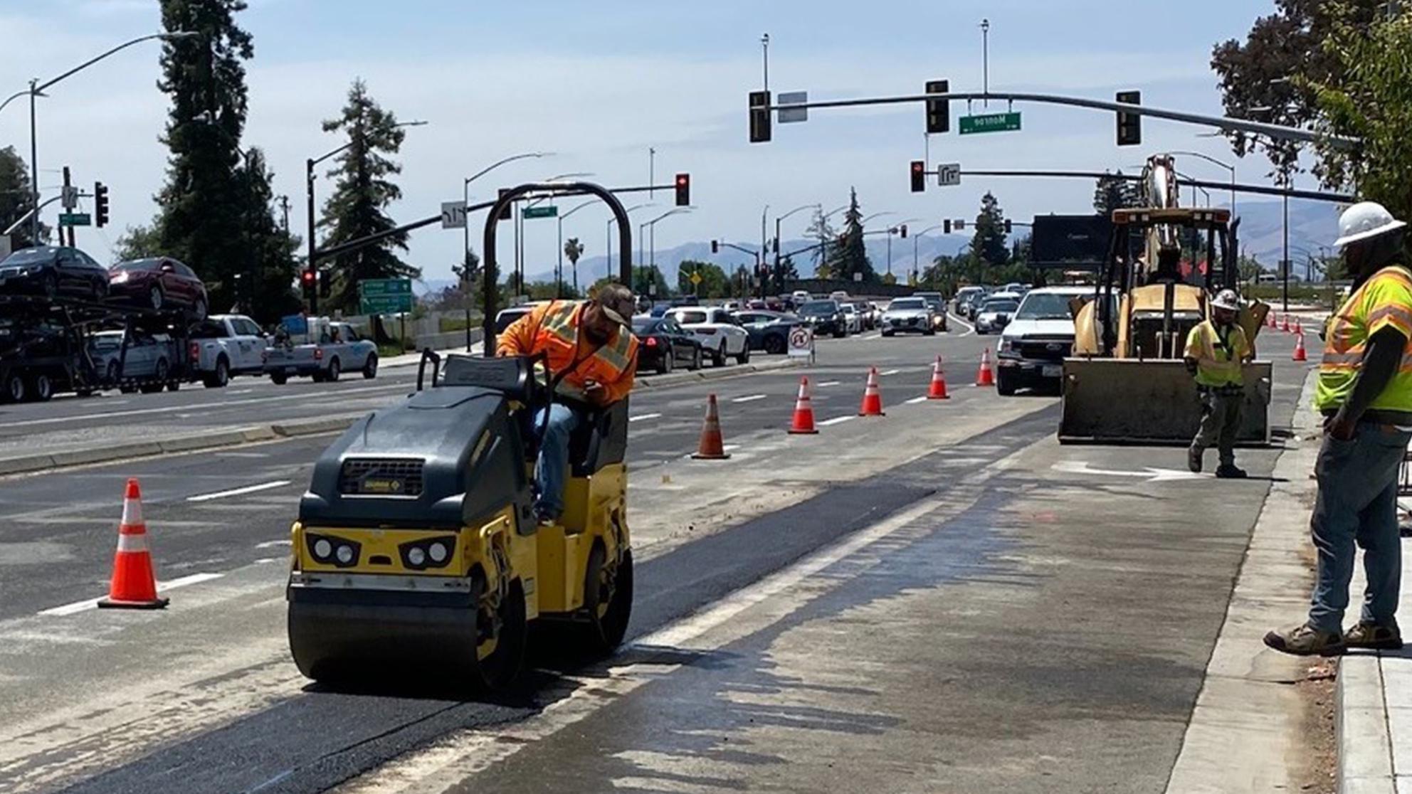 Picture of steam roller paving street